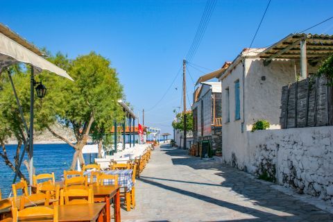 Perdika: Taverns with tables by the sea.