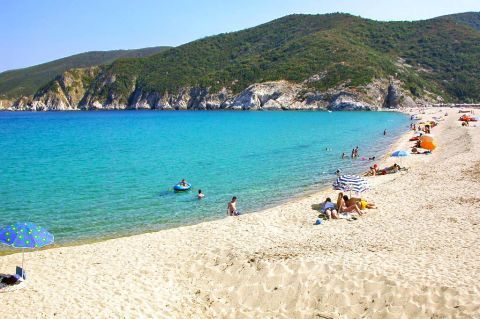 Kalamitsi: A quiet beach with soft sand and clear waters.