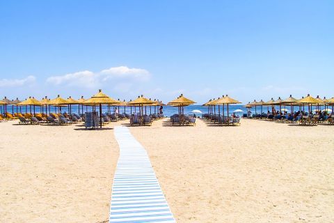 Nea Potidia beach: The beach is well-organized, with many sun-beds and umbrellas.