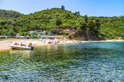 Zografou: Magnificent, emerald waters and dense vegetation combine the exquisite scenery of Zografou beach.