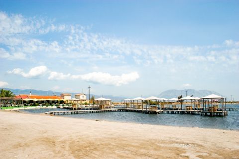 Troulida Beach: This settlement has many wooden houses, called pelades, as well as two bar restaurants and a cafeteria.