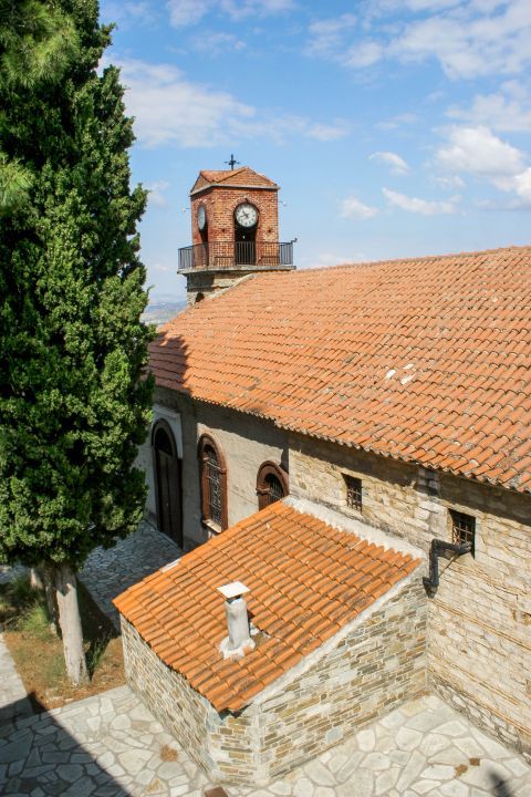 Ano Volos: An old church with ceramic roof tiles and an impressive clock.