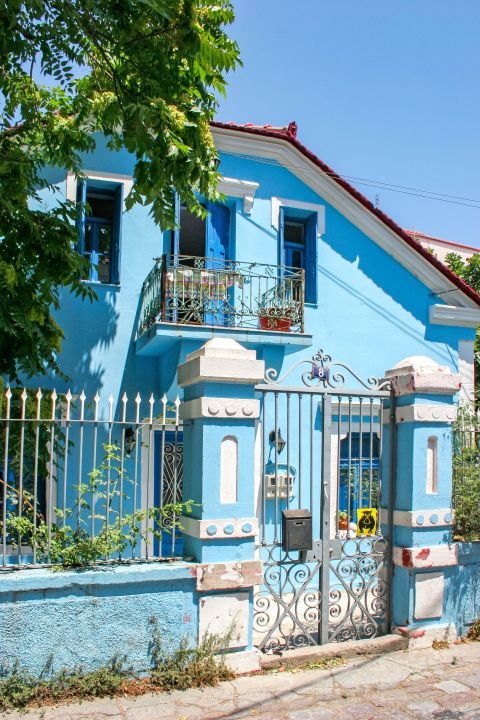 Mytilene: An impressive, blue-colored house.