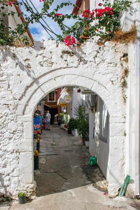 Town: The arch of a whitewashed wall.