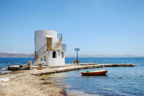Emporios: A whitewashed building, overlooking the sea