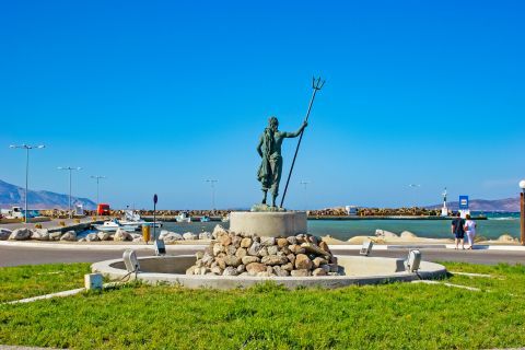 Mastichari: The statue of Neptune, overlooking the sea in Mastichari village.