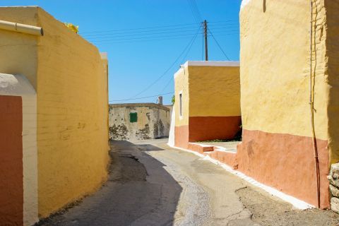 Kattavia: A narrow alley with colorful houses.
