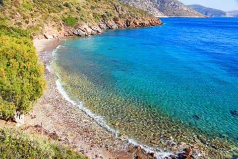 Agia Triada: Agia Triada is a long sandy beach with some shaded areas under the trees.