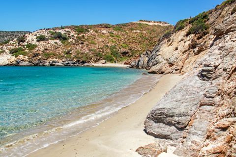 Kassidi: The beach is surrounded by a rocky landscape with arid plantation and blue exotic waters.