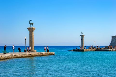 Town: Two statues of deer stand on the supposed location of the ancient Colossus of Rhodes