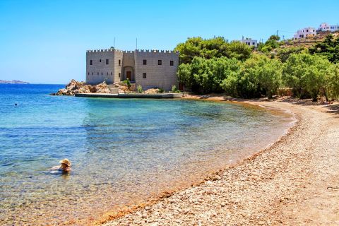 Loukakia: At the right end of the beach, there is a building that looks like a fortress.