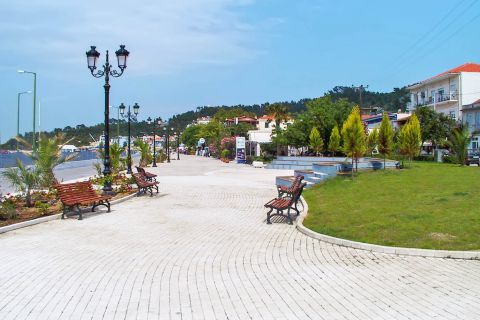 Limenas: A relaxing spot with some benches near the port.
