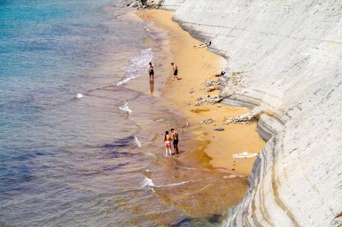 Peroulades:  Peroulades is a narrow beach encircled by imposing hills