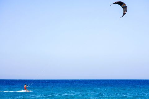 Alykes: Windsurfing on the amazing blue waters of the Ionian.