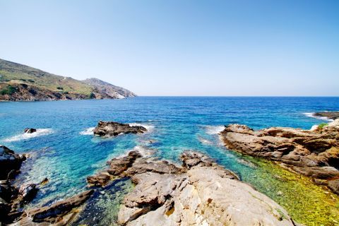 Apollonas: Rock formations and deep blue waters
