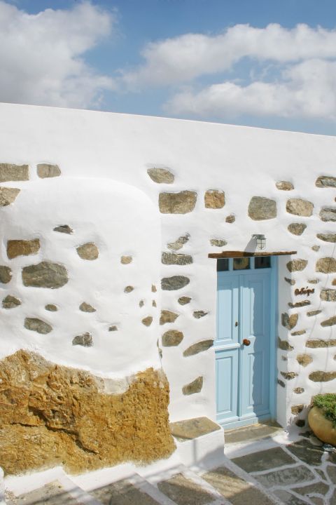 Chora: A stone-built construction, painted in white and blue colors. Chora, Serifos.