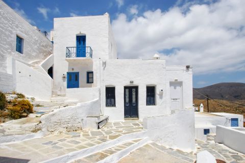 Chora: All houses in Chora are painted in white and blue colors, according to the Cycladic aesthetics.