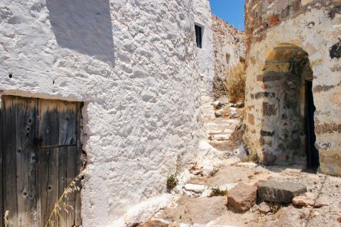 Plaka: Partly ruined constructions. Plaka village, Milos.