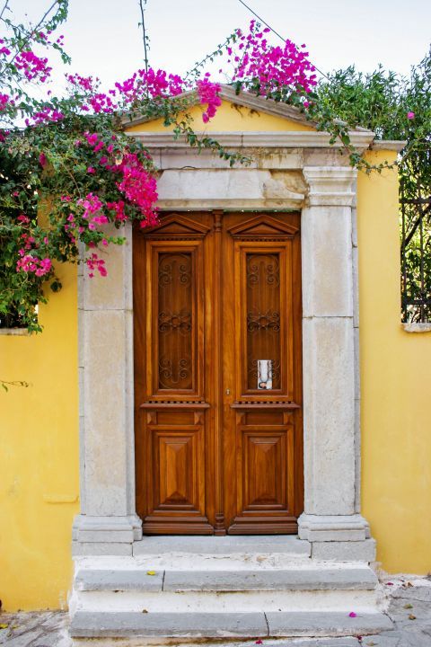 Town: The entrance of a vintage mansion in Symi Town.
