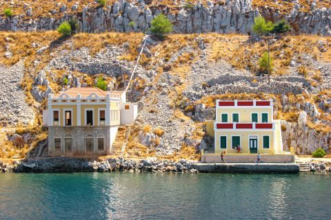 Town: Colorful mansions, overlooking the sea. Symi Town.
