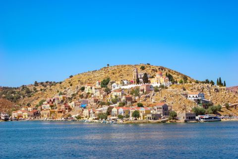 Town: Distant view of Chora, Symi.
