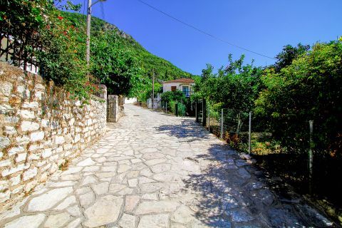Poros: Poros is a village with lots of stone built constructions and paved paths.