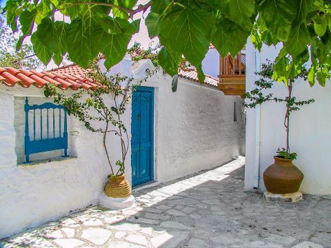 Town: A lovely, whitewashed corner with blue-colored details.