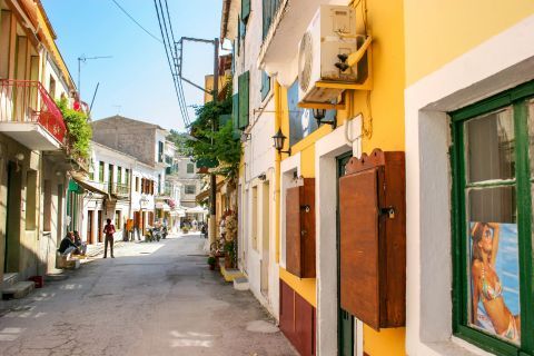 Gaios: A narrow, picturesque street with tourist shops and vintage houses.