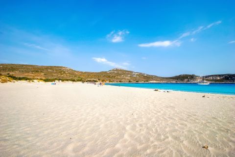 Simos: A tranquil, sandy beach.