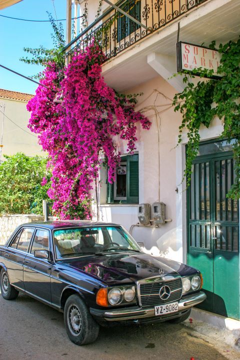 Spartochori: A vintage car, an old house and fuchsia