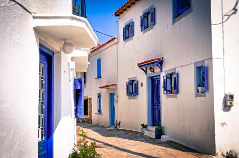 Town: White houses with colorful details are spotted all over the island