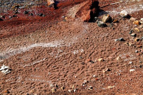 Red Beach: The red-colored sand of the beach