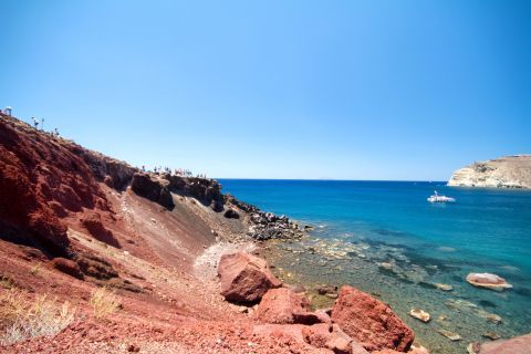 Red Beach: Abrupt cliffs and azure waters