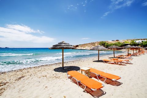 Parasporos: Sun loungers and umbrellas at the seaside