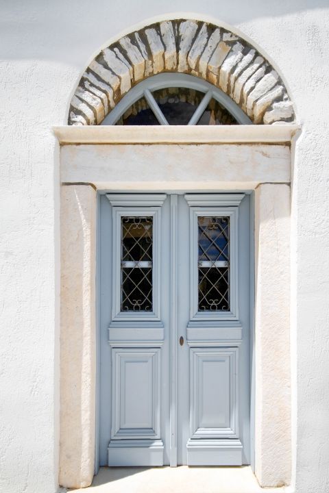 Apiranthos: A grey colored door