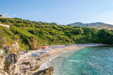 Pipitos Kassiopi: Sandy shores with rich green and blue, crystal clear waters