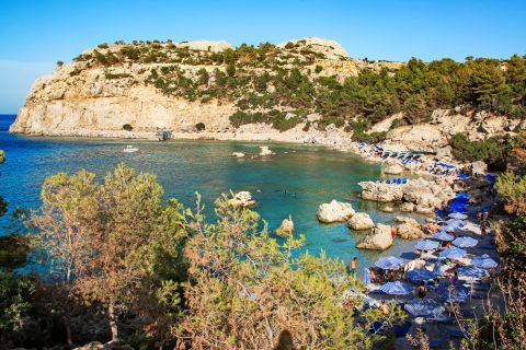 Ladiko Anthony Quinn: The rocky hills that surround the beach create a wild yet impressive scenery adding to the greenery landscape of pine trees.