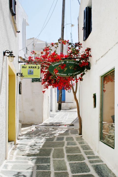 Chora: A whitewashed alley with local shops.