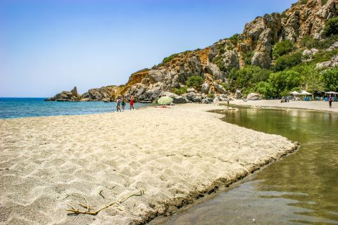 Preveli: Soft sand and emerald waters.