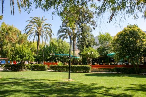 Neapolis: Impressive parks with numerous eateries nearby,